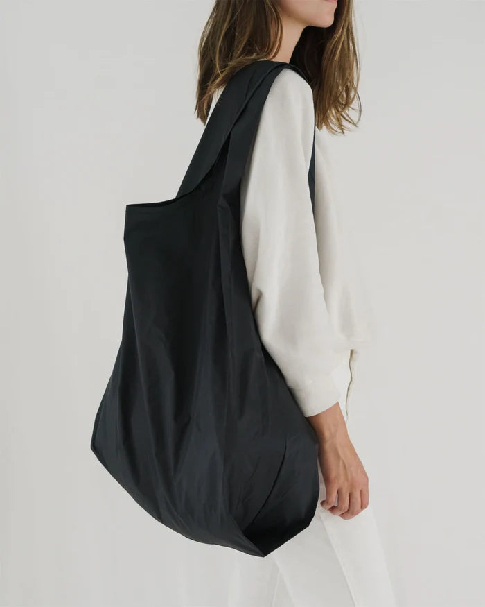 BIG BLACK REUSABLE BAG — by Baggu