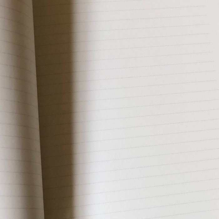 "CROIRE AU MERVEILLEUX" GOLDEN POCKET NOTEBOOK — by Gallimard