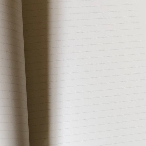 "CROIRE AU MERVEILLEUX" GOLDEN POCKET NOTEBOOK — by Gallimard