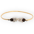 Daisy Black Crystal Flower Belt in stretch gold metal mesh with black and opaline floral crystal buckle