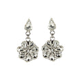 Daisy-shaped drop earrings with crystal drops on a rhodium-plated base