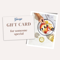 A gift card set from George's Car & Wine Club featuring a large cream card that reads 'GIFT CARD for someone special' and a smaller photo card showing a lobster on a plate with a hand reaching in, on a light beige background.