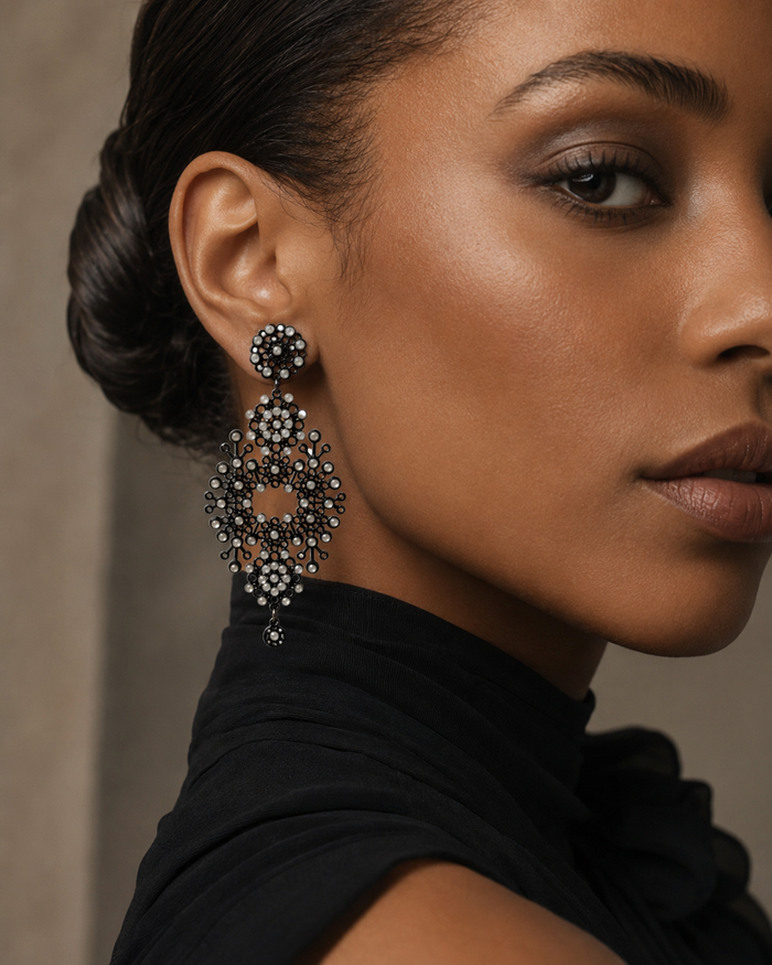Merletti 03 Openwork Drop Earring in Black Pearl shown worn to demonstrate its actual proportions and overall dimensions.