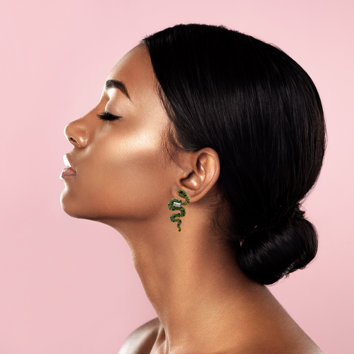 Carlo Zini  Precious Swarovski® crystals inspires the unique design of this extraordinary  snake earrings